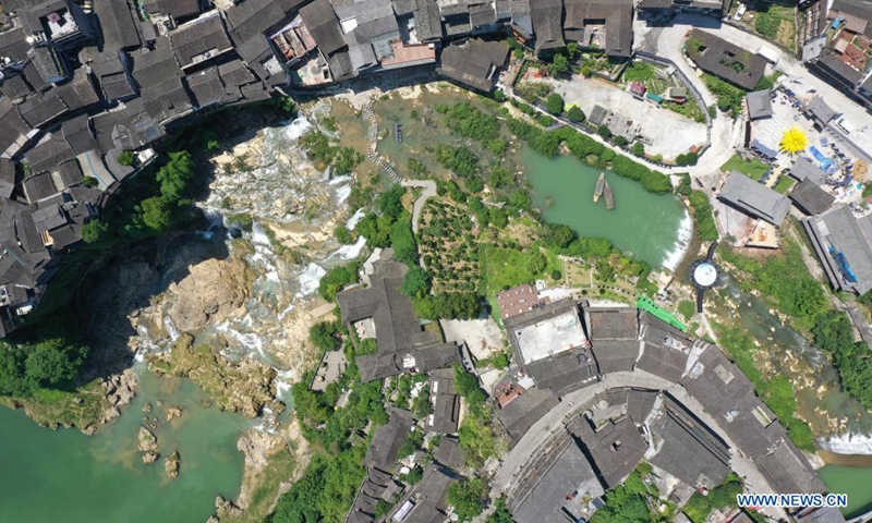 Aerial photo taken on June 22, 2021 shows the scenery of Furong Township in Xiangxi Tujia and Miao Autonomous Prefecture, central China's Hunan Province. (Photo by Liu Zhenjun/Xinhua)
