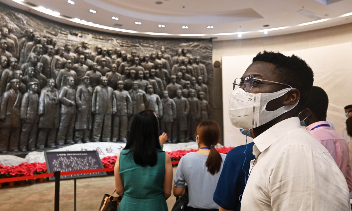 Foreigners visit an exhibition featuring the history of the Communist Party of China (CPC) in Xibaipo on Thursday, days before the centennial of CPC's founding. Xibaipo, a revolutionary base in North China's Hebei Province about 350 kilometers from Beijing, was where the CPC leadership stationed from May 1948 to early 1949 before the founding of the People's Republic of China on October 1, 1949. Photo: cnsphoto