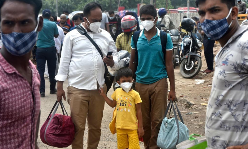 Stranded travellers are seen in Dhaka, Bangladesh, on June 24, 2021. Bangladesh has suspended transport services linking capital Dhaka as the country strives to contain the spread of the COVID-19 pandemic. Bangladesh Railway (BR) announced on Tuesday in a circular to suspend all trains to and from the capital city starting from 12:01 a.m. local time on Wednesday.Photo:Xinhua