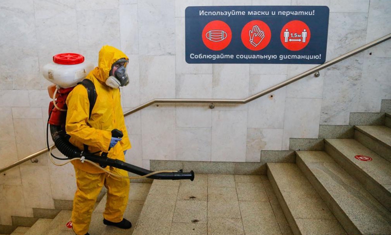 A municipal employee wearing a protective suit disinfects a railway station in Moscow, Russia, on June 24, 2021. Russia logged 20,182 new coronavirus infections over the past 24 hours, the highest daily increase since Jan. 24, taking the nationwide tally to 5,388,695, the official monitoring and response center said Thursday.Photo:Xinhua