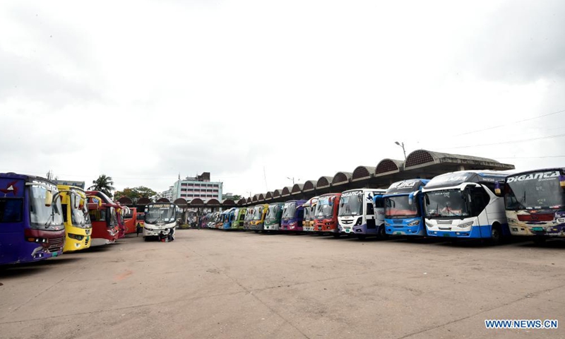 Buses are parked at a station in Dhaka, Bangladesh, on June 24, 2021. Bangladesh has suspended transport services linking capital Dhaka as the country strives to contain the spread of the COVID-19 pandemic. Bangladesh Railway (BR) announced on Tuesday in a circular to suspend all trains to and from the capital city starting from 12:01 a.m. local time on Wednesday.\ Photo:Xinhua