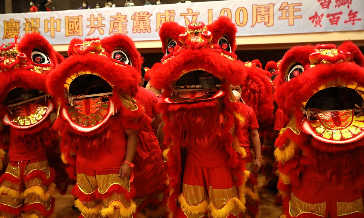Hong Kong residents perform the lion dance on June 20 to celebrate the centennial of the Communist Party of China's founding and the 24th anniversay of Hong Kong's return to the motherland.  Photo: Xinhua
