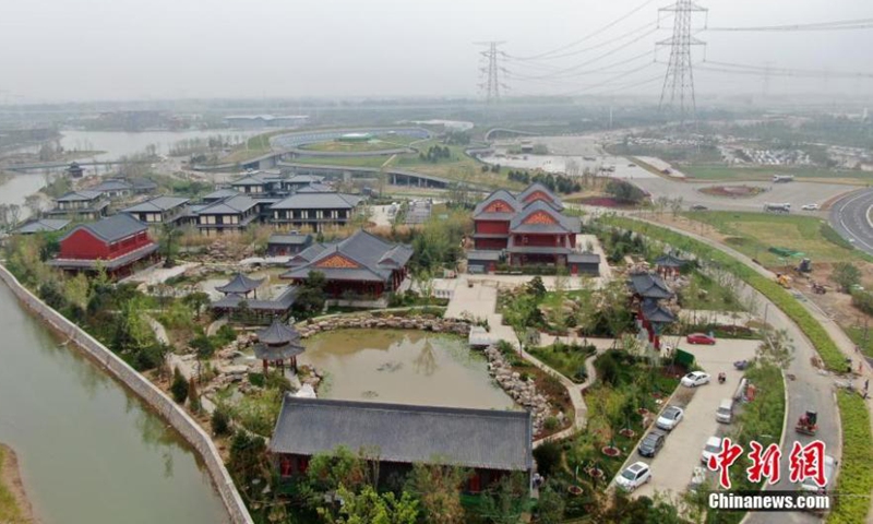 Aerial photo shows the scenery of the Xiongan Suburb Park in Xiongan New Area, north China's Hebei Province on June 26, 2021. The park accounts for 268,000 mu (about 1,786 hectares) in total. As one of the ecological restoration patterns, it will become China's largest city country park after complement. (Photo/ China News Service: Han Bing)