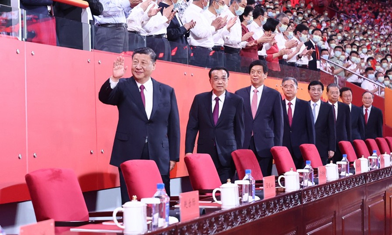 An art performance was held in Beijing on Monday evening in celebration of the 100th anniversary of the founding of the Communist Party of China (CPC). Party and state leaders Xi Jinping, Li Keqiang, Li Zhanshu, Wang Yang, Wang Huning, Zhao Leji, Han Zheng and Wang Qishan joined about 20,000 people to watch the performance, titled The Great Journey, at the National Stadium.(Photo: Xinhua)