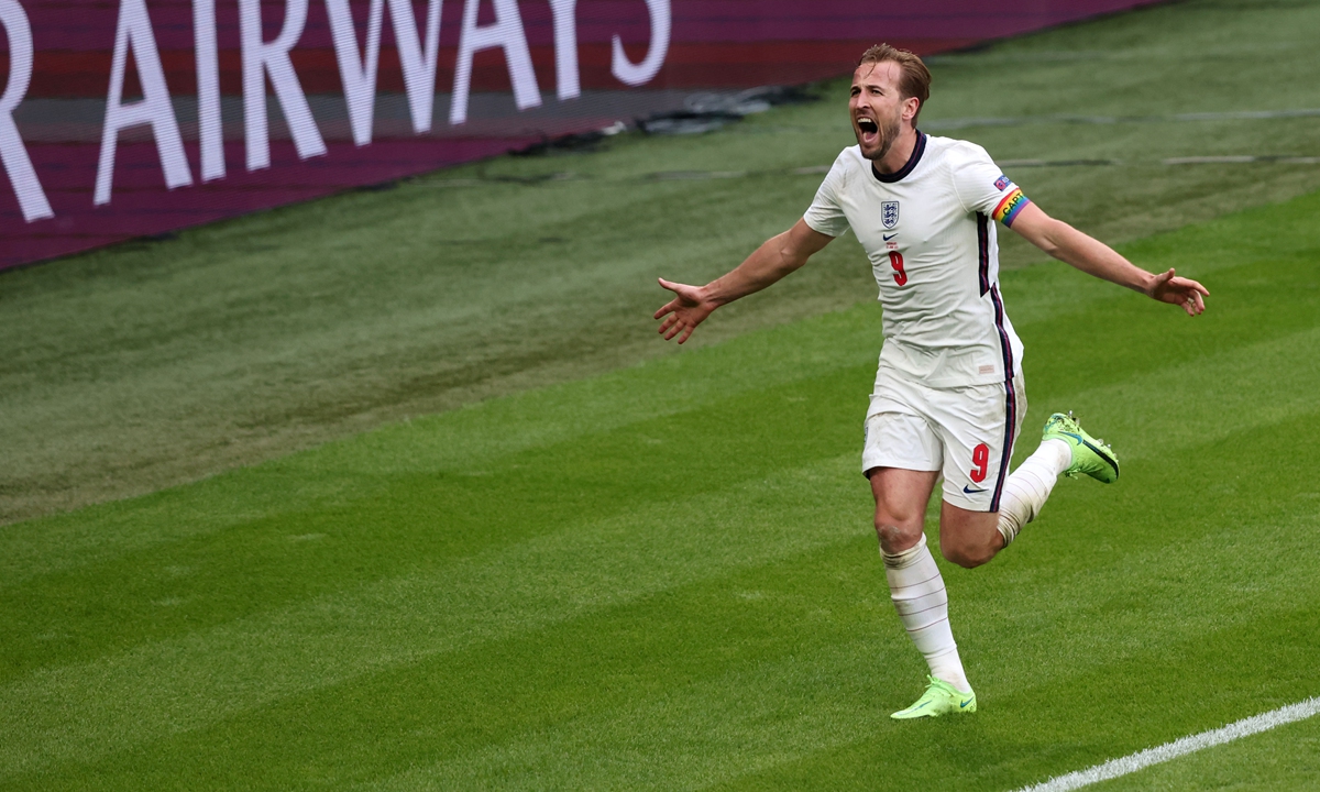 England striker Harry Kane celebrates scoring against Germany at Wembley Stadium on Tuesday in London, England. Photo: VCG