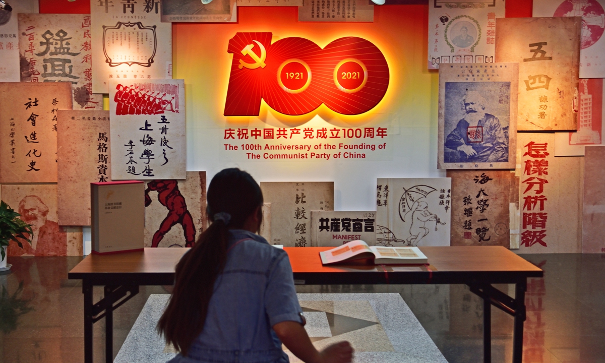 A woman visits an exhibition on CPC history at the Shanghai Library. Photo: VCG