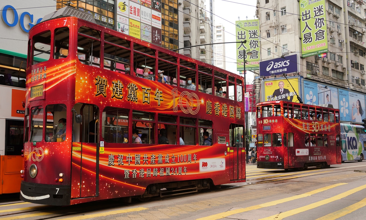 Themed trams celebrating the centennial of the CPC's founding are seen in Hong Kong. Photo: VCG