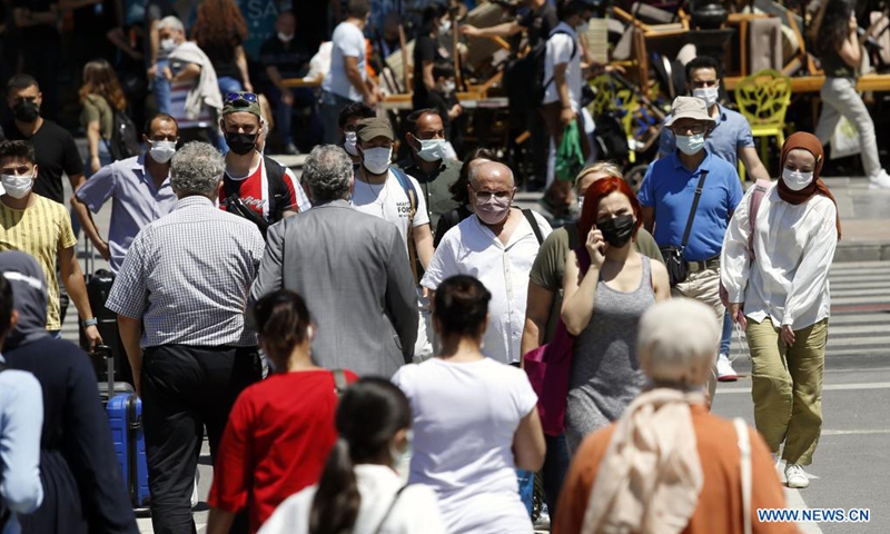 Pedestrians walk on a street in Ankara, Turkey, on July 1, 2021. Turkey on Thursday cancelled most of its COVID-19 restrictions on businesses and events, and lifted nighttime and Sunday curfews after daily infection numbers remain steadily around 5,000 cases.Photo:Xinhua