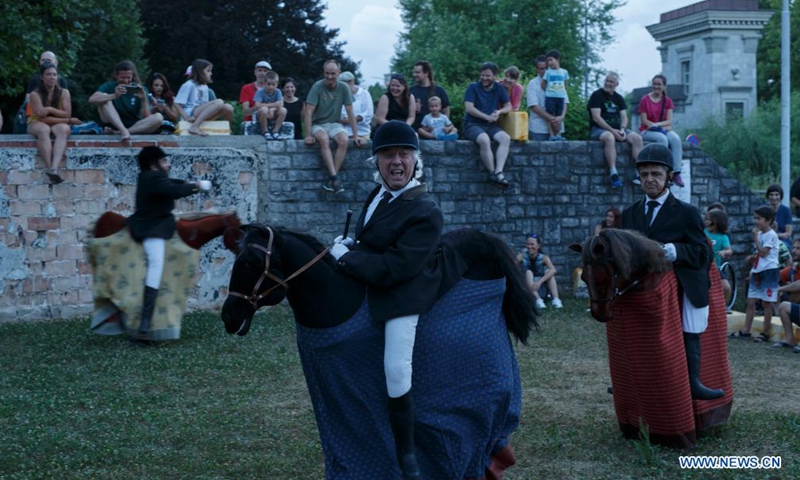 Artists perform during the 2021 Ana Desetnica International Street Theatre Festival in Ljubljana, Slovenia, June 30, 2021. Photo:Xinhua