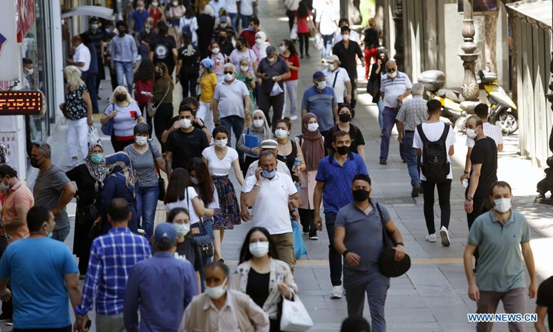 Pedestrians walk on a street in Ankara, Turkey, on July 1, 2021. Turkey on Thursday cancelled most of its COVID-19 restrictions on businesses and events, and lifted nighttime and Sunday curfews after daily infection numbers remain steadily around 5,000 cases.Photo:Xinhua