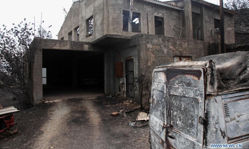 A burned house is seen at Melini village in Limassol district, Cyprus, July 4, 2021. Four people were killed in a mammoth forest fire which has been raging for almost 24 hours in a mountainous area of Cyprus, police said on Sunday.(Photo: Xinhua)