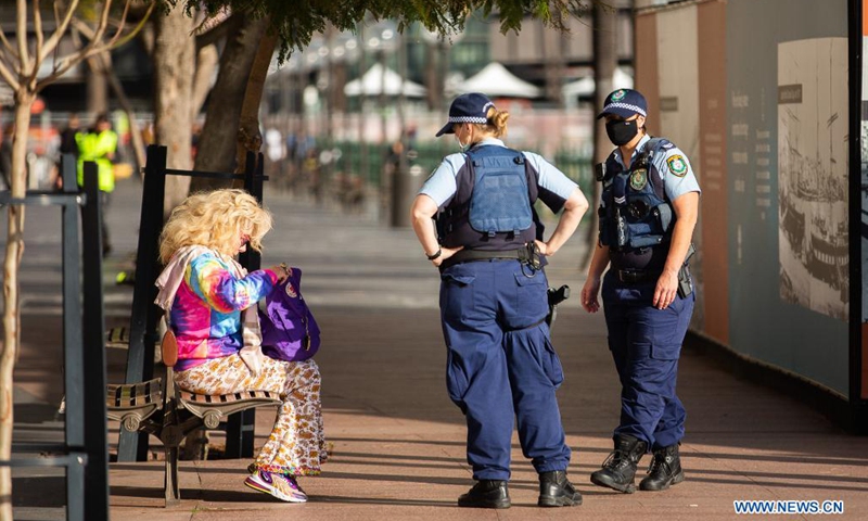 Police officers work on the street in Sydney, Australia, on July 5, 2021. Authorities of the Australian state of New South Wales (NSW) said compliance is key to a smooth exit from the two-week lockdown, as 35 locally acquired COVID-19 cases were reported on Monday.(Photo: Xinhua)