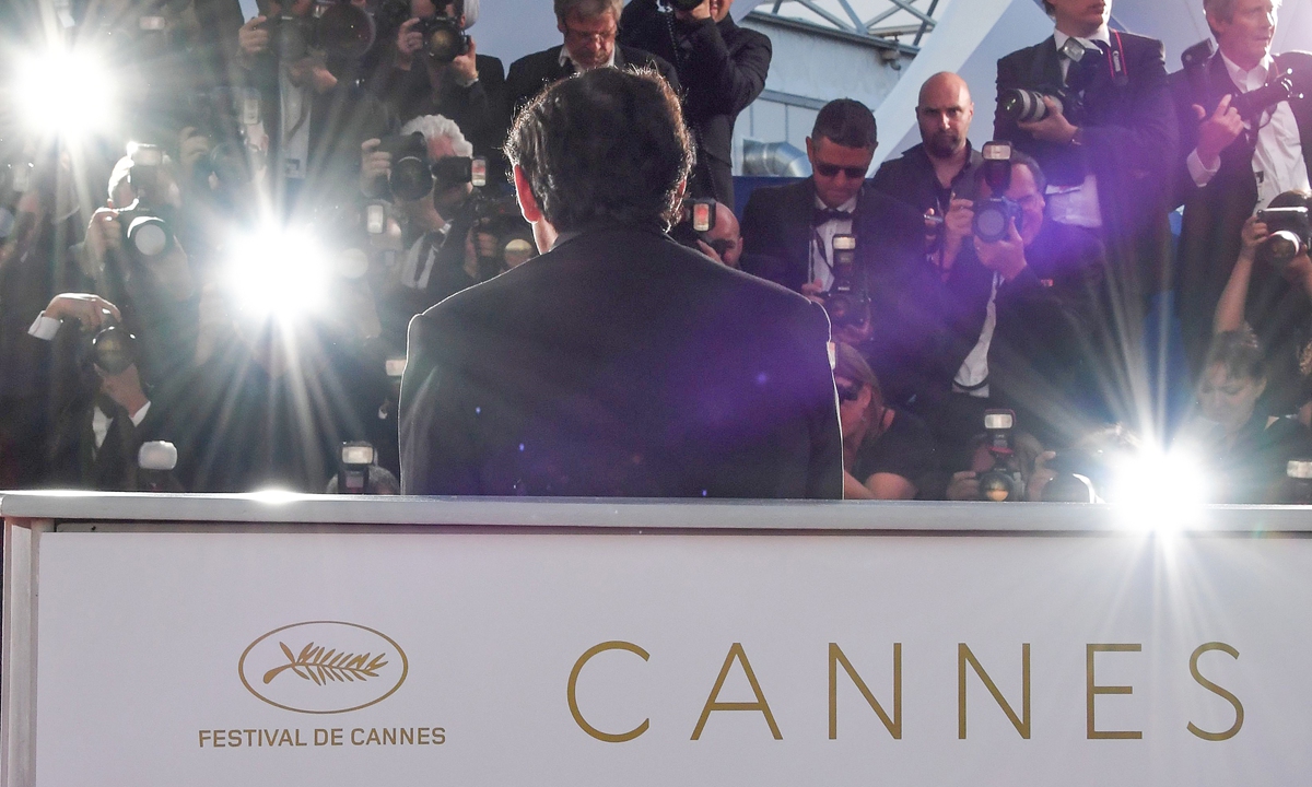 Italian actor Marcello Fonte (front) poses for photos on May 19, 2018 at the 71st edition of the Cannes Film Festival in Cannes, southern France. Photo: AFP