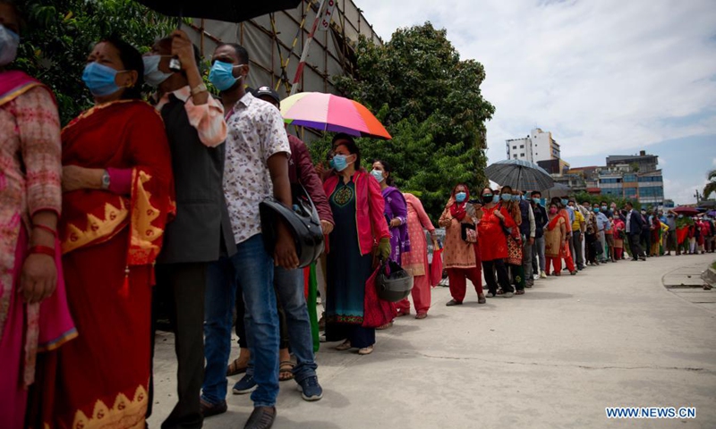People queue up to get the second doses of COVID-19 vaccines in Kathmandu, Nepal on July 6, 2021.(Photo: Xinhua)