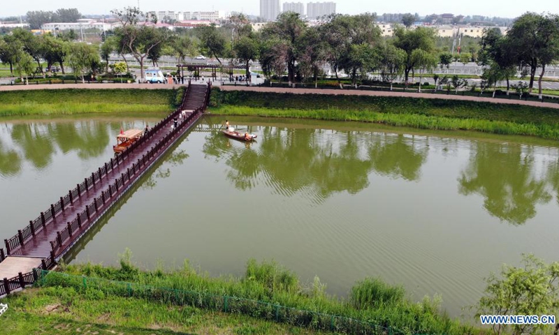 Aerial photo taken on July 6, 2021 shows a view along the Grand Canal in Cangzhou City of north China's Hebei Province. Authorities in Cangzhou City has been actively promoting the Grand Canal culture by improving scenery along the watercourse so that visitors may have close experience with its beauty.(Photo: Xinhua)