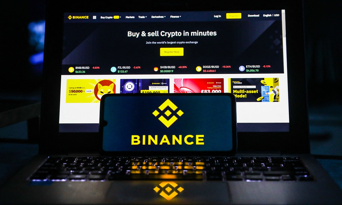 Binance logo is displayed on a mobile phone screen. Photo: AFP