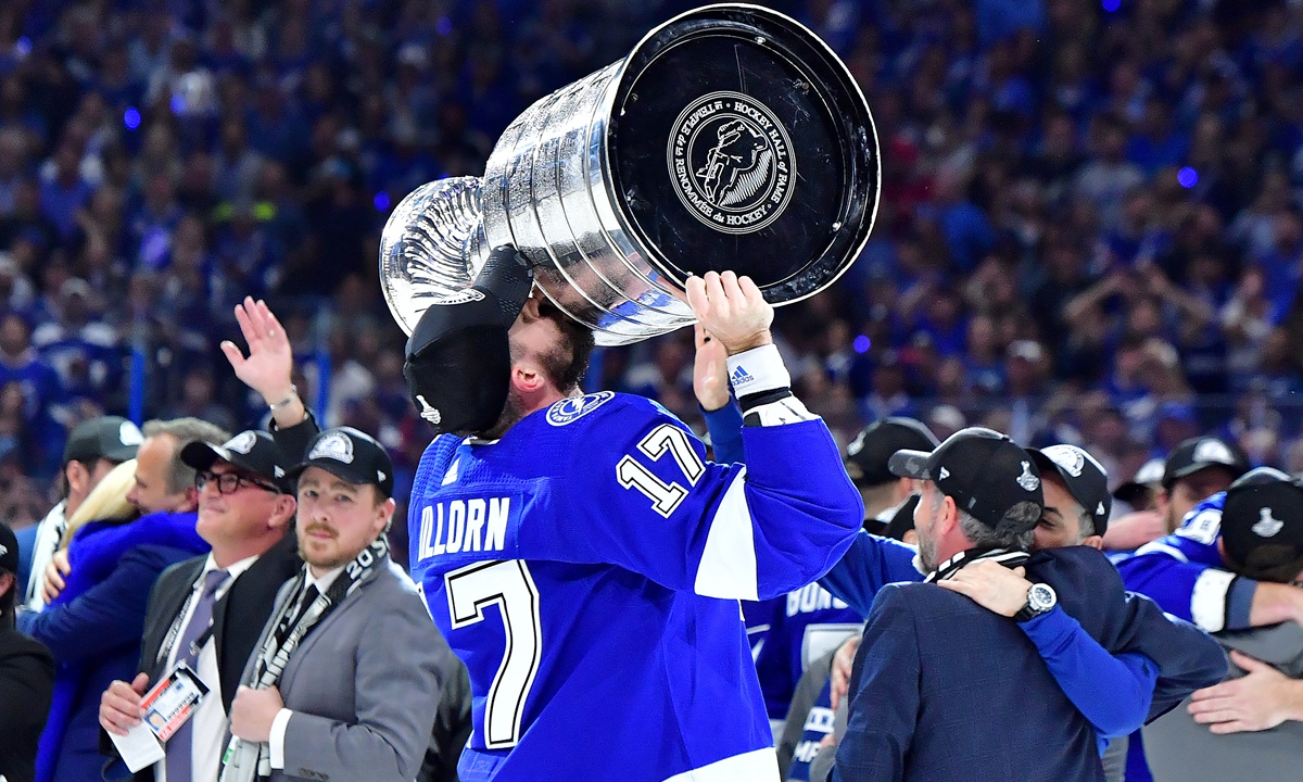Alex Killorn of the Tampa Bay Lightning hoists the Stanley Cup on Wednesday in Tampa, Florida. Photo: AFP