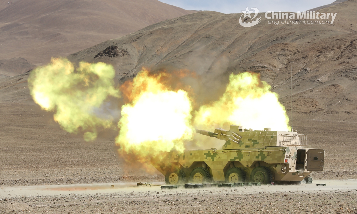 Vehicle-mounted howitzers attached to an artillery detachment with a combined arms regiment under the PLA Army fires high explosive shells at mock remote targets during a live-fire training exercise in depopulated region in mid-June, 2021. The exercise focused on such training items as autonomous surveillance, reduced-crew operation, motorized mobilization.Photo:China Military