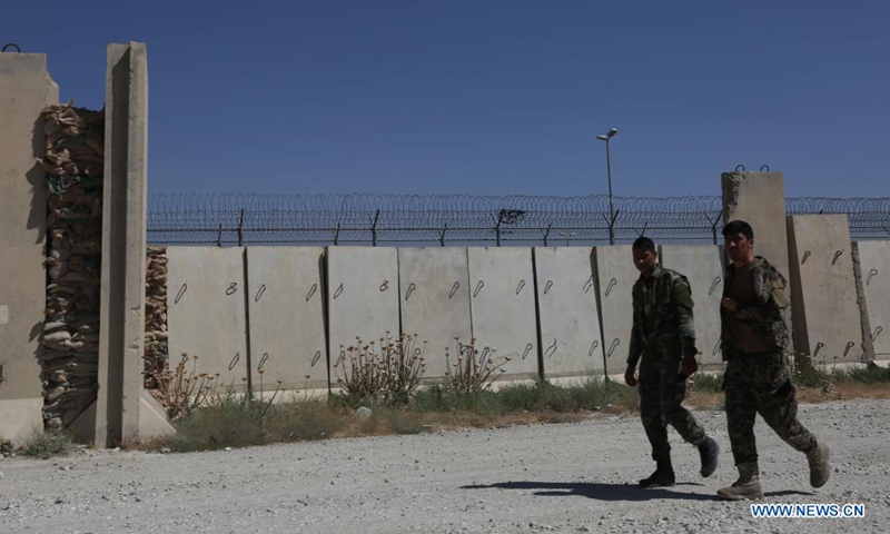 Afghan security force members walk inside the Bagram Airfield after all U.S. and NATO forces evacuated in Parwan province, eastern Afghanistan, July 8, 2021. Photo:Xinhua