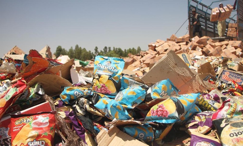 Photo taken on July 8, 2021 shows expired medicines and substandard food items in Jalalabad, capital of Nangarhar province, Afghanistan. The Afghan health authorities set on fire up to 170 tons of expired medicines and substandard food items in the country's eastern Nangarhar province on Thursday, the provincial government confirmed. Photo:Xinhua
