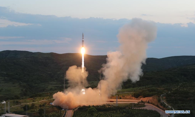 A Long March-6 carrier rocket carrying the Zhongzi-02 satellite group blasts off from the Taiyuan Satellite Launch Center, in north China's Shanxi Province, July 9, 2021. China on Friday successfully sent a new satellite group into preset orbit from the Taiyuan Satellite Launch Center in north China's Shanxi Province. The Zhongzi-02 satellite group was launched by a Long March-6 carrier rocket at 7:59 p.m. (Beijing Time).Photo:Xinhua