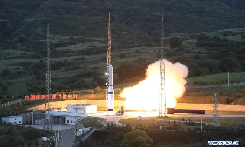 A Long March-6 carrier rocket carrying the Zhongzi-02 satellite group blasts off from the Taiyuan Satellite Launch Center, in north China's Shanxi Province, July 9, 2021. China on Friday successfully sent a new satellite group into preset orbit from the Taiyuan Satellite Launch Center in north China's Shanxi Province. The Zhongzi-02 satellite group was launched by a Long March-6 carrier rocket at 7:59 p.m. (Beijing Time).Photo:Xinhua