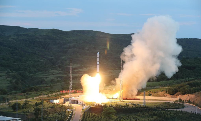 A Long March-6 carrier rocket carrying the Zhongzi-02 satellite group blasts off from the Taiyuan Satellite Launch Center, in north China's Shanxi Province, July 9, 2021. China on Friday successfully sent a new satellite group into preset orbit from the Taiyuan Satellite Launch Center in north China's Shanxi Province. The Zhongzi-02 satellite group was launched by a Long March-6 carrier rocket at 7:59 p.m. (Beijing Time).Photo:Xinhua