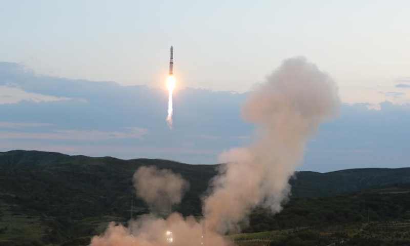 A Long March-6 carrier rocket carrying the Zhongzi-02 satellite group blasts off from the Taiyuan Satellite Launch Center, in north China's Shanxi Province, July 9, 2021. China on Friday successfully sent a new satellite group into preset orbit from the Taiyuan Satellite Launch Center in north China's Shanxi Province. The Zhongzi-02 satellite group was launched by a Long March-6 carrier rocket at 7:59 p.m. (Beijing Time).Photo:Xinhua