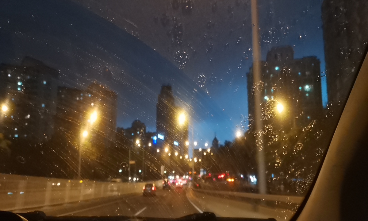 Downtown Beijing in the rain on Sunday evening as seen from within a taxi Photo: Courtesy of Ah Bu 