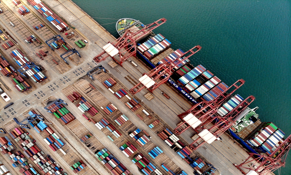 An aerial picture shows a terminal of Lianyungang Port in East China's Jiangsu Province on Sunday. In the first half of 2021, cargo throughput at the port reached 134.41 million tons, up 6.29 percent year-on-year, and container throughput was 2.49 million standard containers, up 4.26 percent. Photo: VCG
