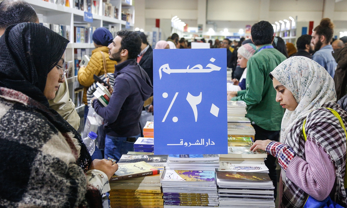 Egyptians and foreigners attend the 50th Cairo International Book Fair in Cairo, Egypt on January 25, 2019. Photo: AFP