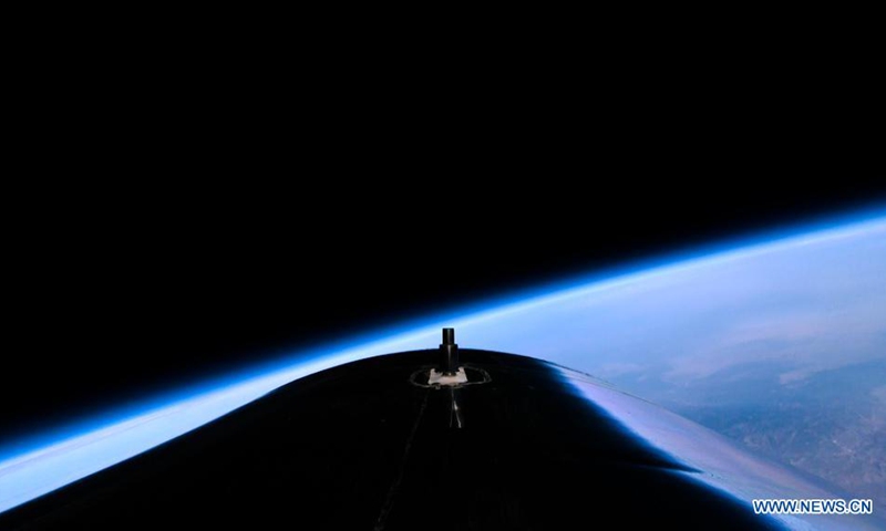 Photo released by Virgin Galactic on July 11, 2021 shows the company's spacecraft VSS Unity tail cone view from space. Space tourism company Virgin Galactic completed its first fully crewed test flight of its spacecraft on Sunday, making a giant leap toward commercial suborbital spaceflight. The mission, dubbed Unity 22, was the company's fourth crewed spaceflight, and the 22nd flight test for the company's spacecraft VSS Unity.(Photo: Xinhua)