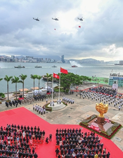 Lee leads other senior officials in attending the flag-raising ceremony on July 1 at the Golden Bauhinia Square of Hong Kong. Photo: IC