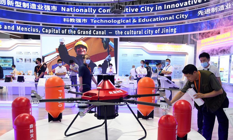 People visit the 2021 New Growth Drivers Fair (Qingdao) in Qingdao, east China's Shandong Province, July 15, 2021. Themed New Pattern, New Growth Drivers, New Opportunity, the 2021 New Growth Drivers Fair (Qingdao) kicked off in Qingdao on Thursday. (Xinhua)