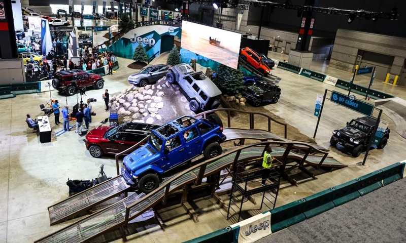 Various models of Jeeps show their off road capabilities on obstacle course at the 2021 Chicago Auto Show held at McCormick Place in Chicago, the United States, on July 15, 2021. The 2021 Chicago Auto Show kicked off on Thursday with more than 20 manufacturers from all over the world showcasing their latest vehicles.Photo:Xinhua