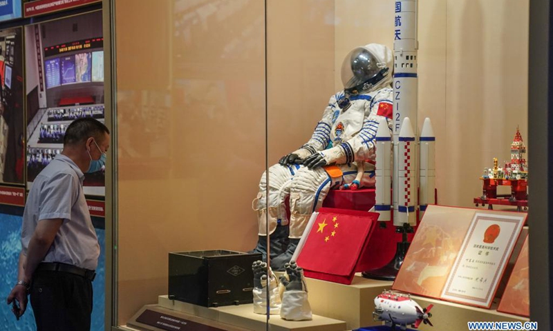 A visitor views exhibits at the Museum of the Communist Party of China (CPC) in Beijing, capital of China, July 15, 2021. Located in the Chaoyang District of Beijing, the Museum of the CPC opens to the public from July 15 and accepts online appointments for free visits from 9 a.m. to 5 p.m.Photo:Xinhua