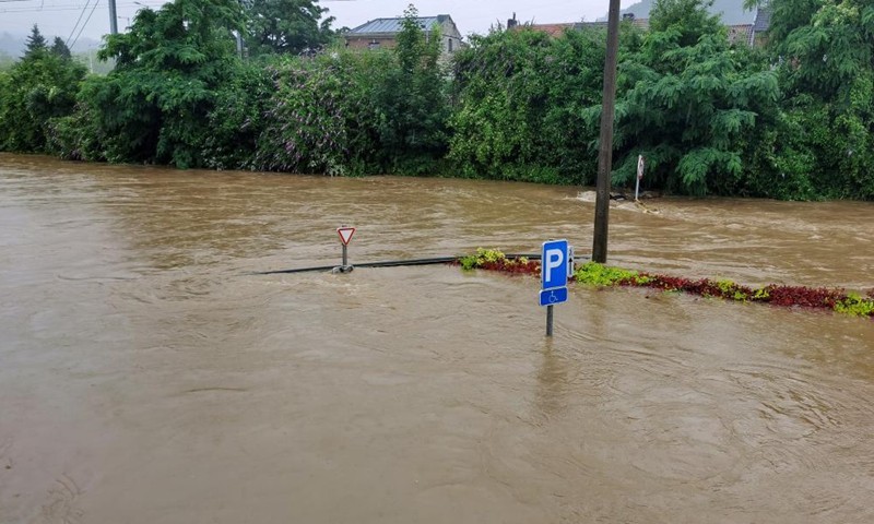 Photo taken with a mobile phone on July 15, 2021 shows a flooded street in Liege, Belgium. Torrential rain has caused severe disruptions in Belgium on Thursday, with entire streets and villages inundated by heavy flooding. Photo:Xinhua
