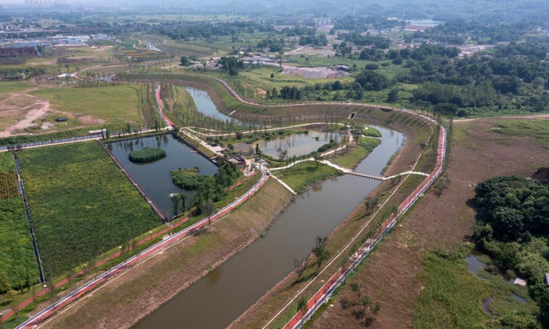 Aerial photo taken on July 14, 2021 shows the Hangu section of Liangtan River in southwest China's Chongqing. The water quality and ecosystem of Liangtan River in Chongqing has been improved in recent years thanks to the city's ecological restoration efforts.Photo:Xinhua