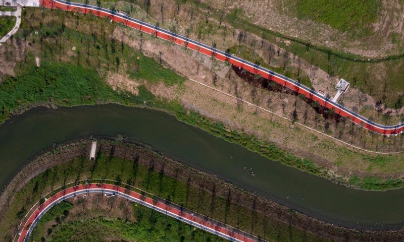 Aerial photo taken on July 14, 2021 shows the Hangu section of Liangtan River in southwest China's Chongqing. The water quality and ecosystem of Liangtan River in Chongqing has been improved in recent years thanks to the city's ecological restoration efforts.Photo:Xinhua