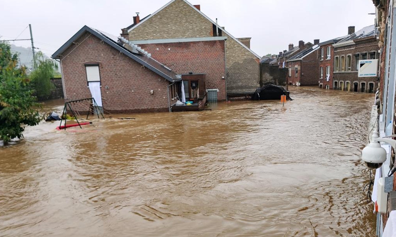 Photo taken with a mobile phone on July 15, 2021 shows a flooded street in Liege, Belgium. Torrential rain has caused severe disruptions in Belgium on Thursday, with entire streets and villages inundated by heavy flooding.Photo:Xinhua