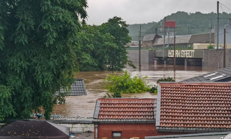 Photo taken with a mobile phone on July 15, 2021 shows a flooded street in Liege, Belgium. Torrential rain has caused severe disruptions in Belgium on Thursday, with entire streets and villages inundated by heavy flooding.Photo:Xinhua