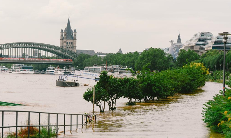 The bank of the river Rhine is seen flooded in Cologne, western Germany, on July 15, 2021.Photo:Xinhua