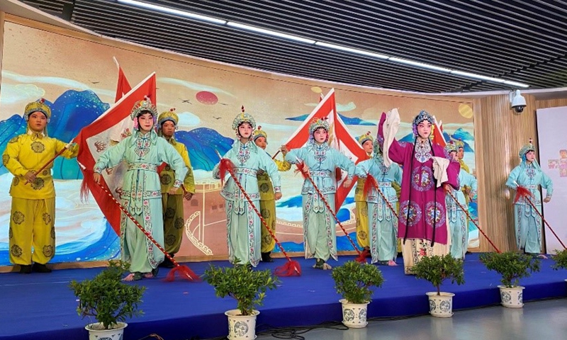 Students from Siyuan Junior High School perform Peking Opera at the camp’s opening ceremony in Shanghai on Monday. Photo: Yu Xi/GT