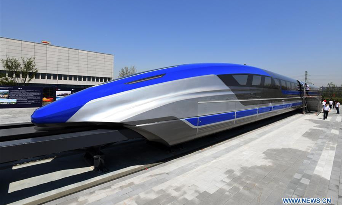 Photo taken on May 23, 2019 shows China's first high-speed maglev train testing prototype in Qingdao, east China's Shandong Province. China on Thursday rolled off the production line a prototype magnetic-levitation train with a designed top speed of 600 km per hour in the eastern city of Qingdao.(Xinhua/Li Ziheng)