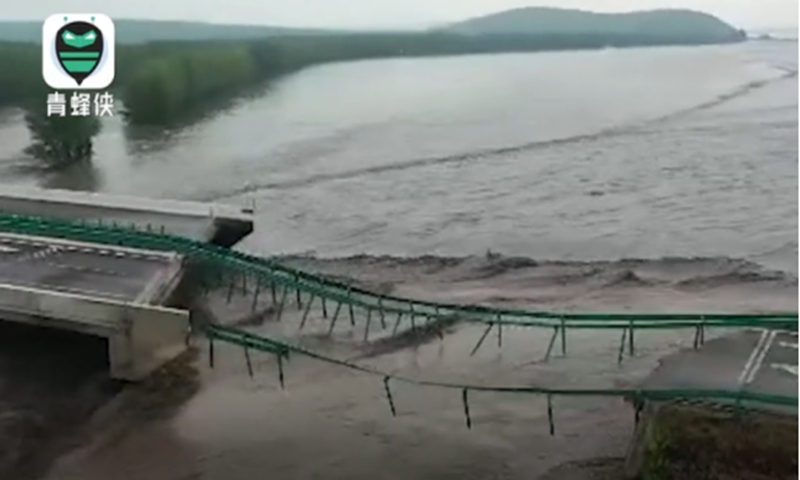 A dam in Hulun Buir City in North China's Inner Mongolia reportedly collapsed on Sunday because of heavy rain since Saturday. No injuries have been reported. Photo: Tencent Video