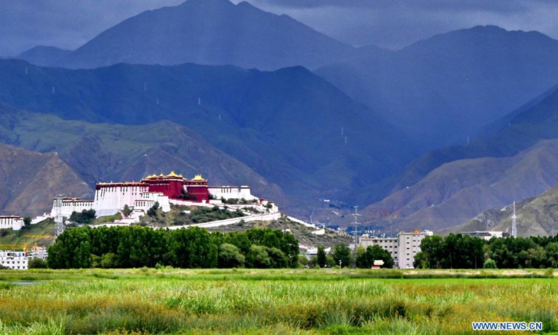 The Potala Palace is seen near the Lhalu wetland national nature reserve in Lhasa, southwest China's Tibet Autonomous Region, July 17, 2021.(Photo: Xinhua)
