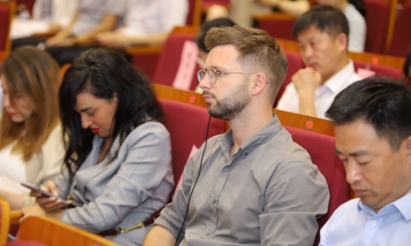Audience attending the conference held in Shanghai on Tuesday. Photo: Courtesy of Fudan University