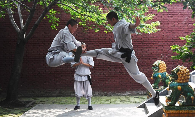 Shaolin monks practice martial arts at Shaolin Temple in Dengfeng City, central China's Henan Province, July 8, 2021. Located on the Songshan Mountain, Shaolin Temple is the birthplace for Shaolin Martial Arts. (Photo: Xinhua)