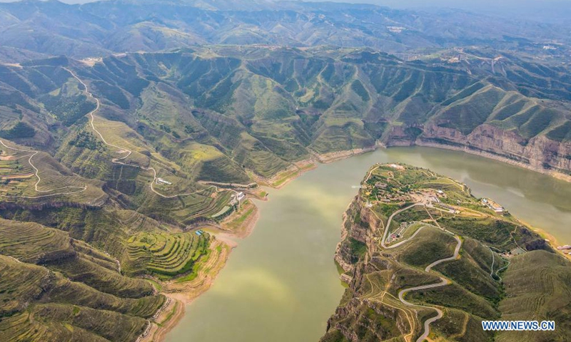 Aerial photo taken on July 21, 2021 shows the canyon scenery of the Yellow River in Jungar Banner, north China's Inner Mongolia Autonomous Region.(Xinhua)