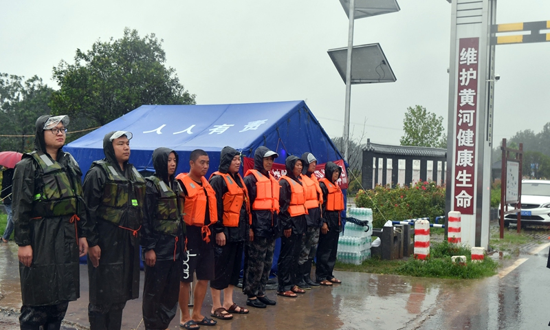 Flood-control workers prepare to patrol Danhe River in Chenzhuang Village, Motou Township, Bo'ai County of Jiaozuo, central China's Henan Province, July 20, 2021.(Photo: Xinhua)